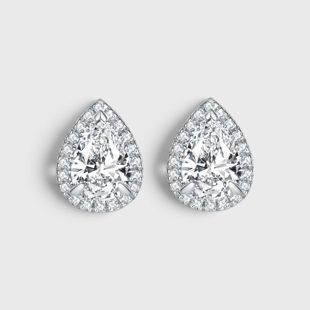 Серебряные серьги с циркониями огранки «груша»