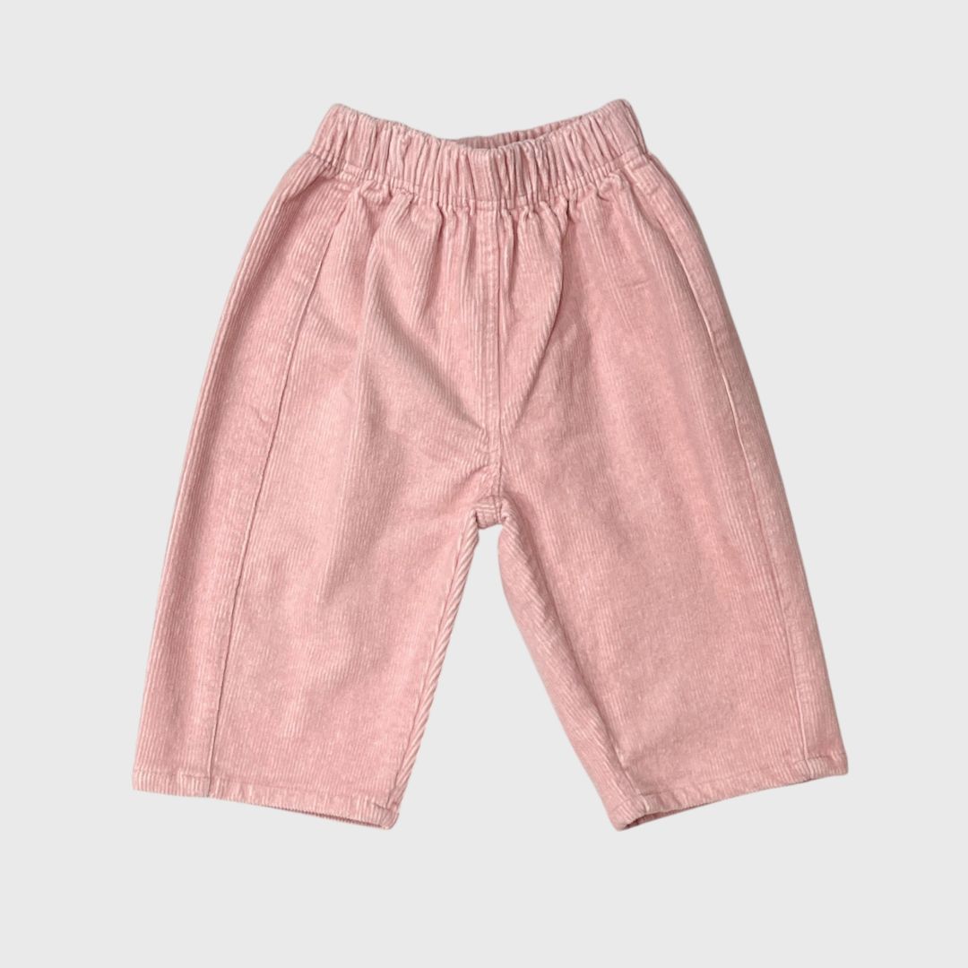 Розовые брюки