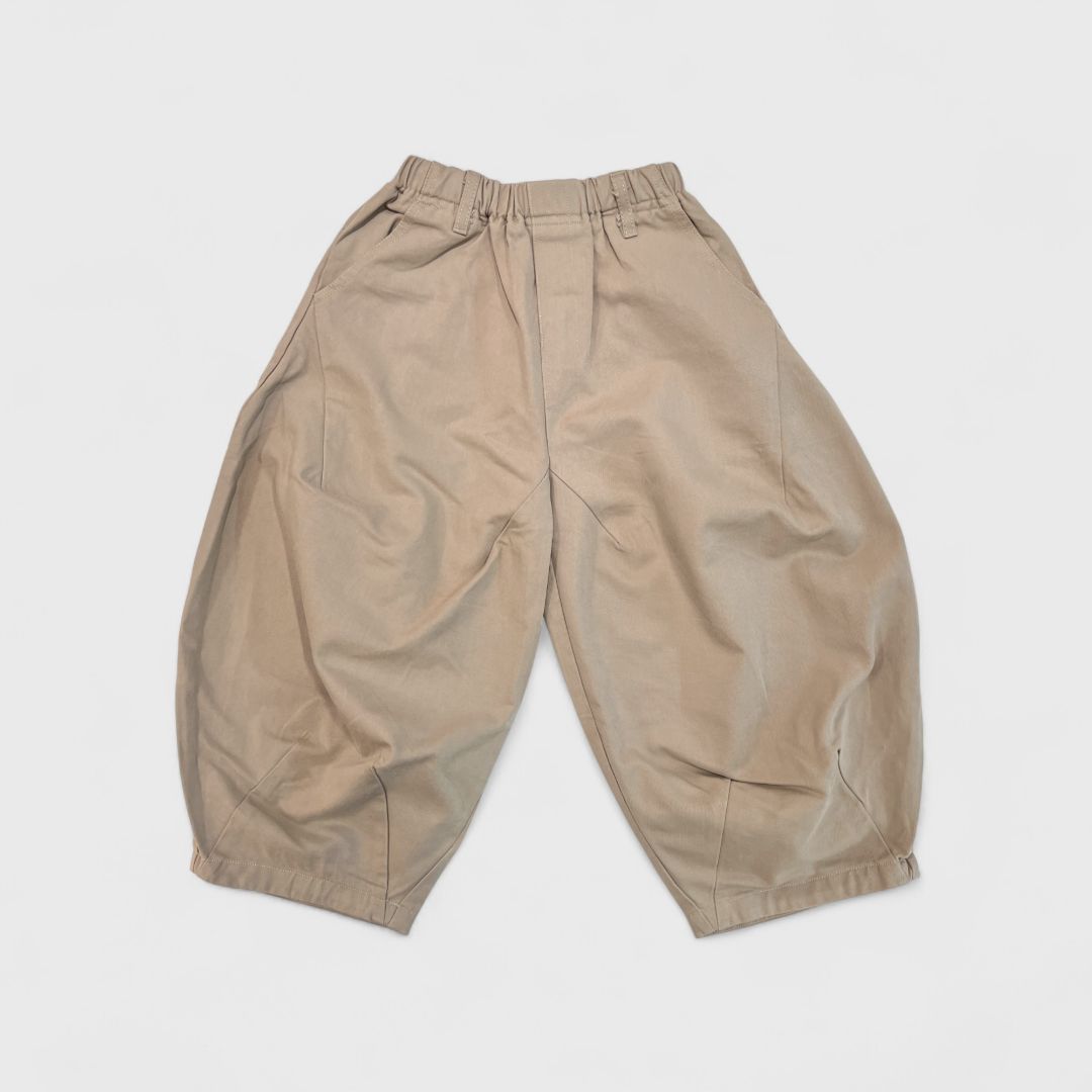 Бежевый банан брюки