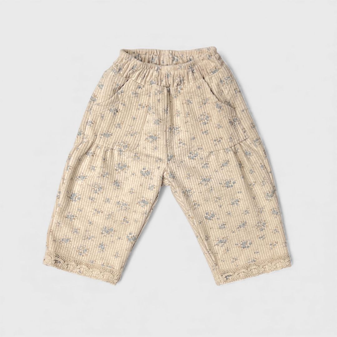 Бежевые цветные брюки с цветами