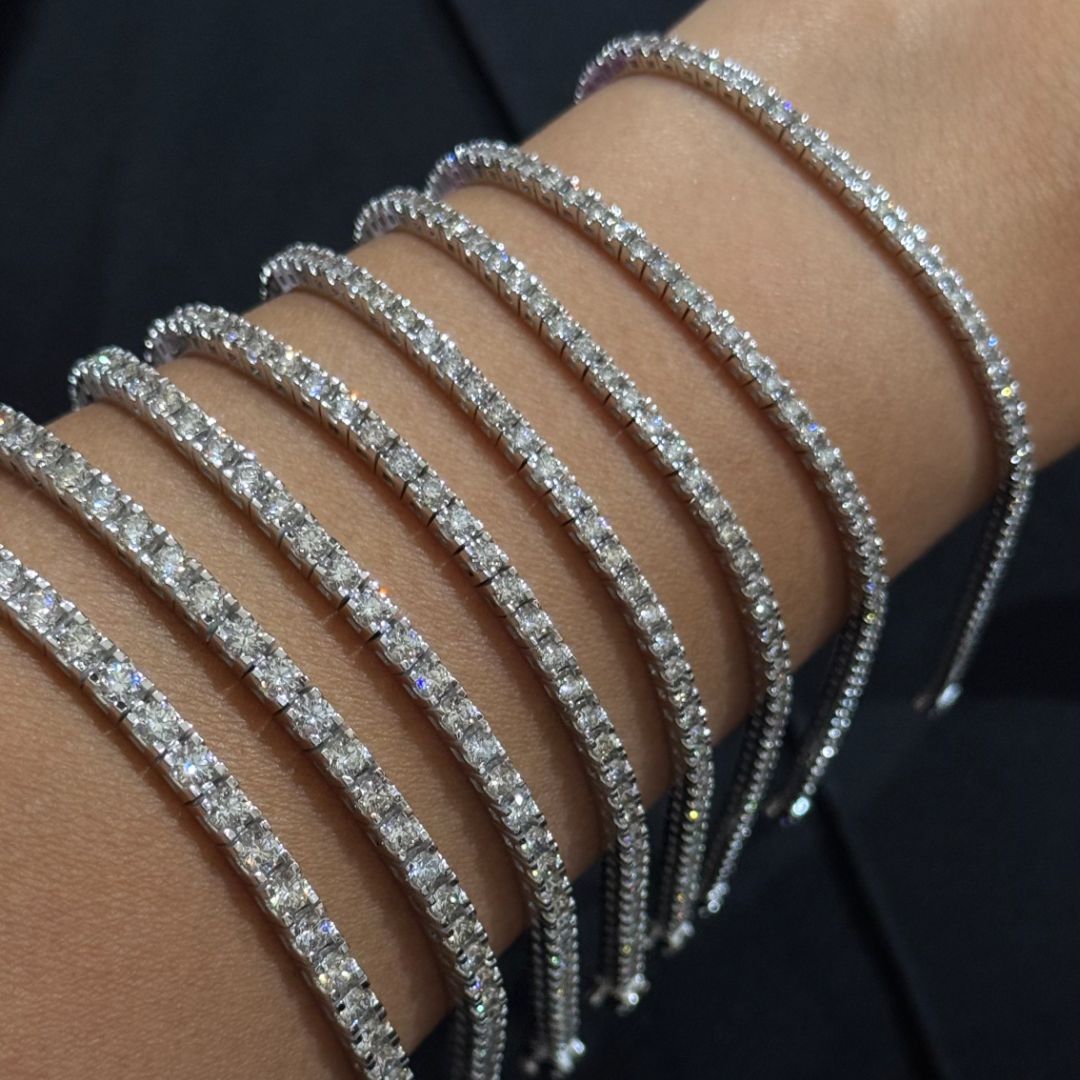 Золотые браслеты с камнями