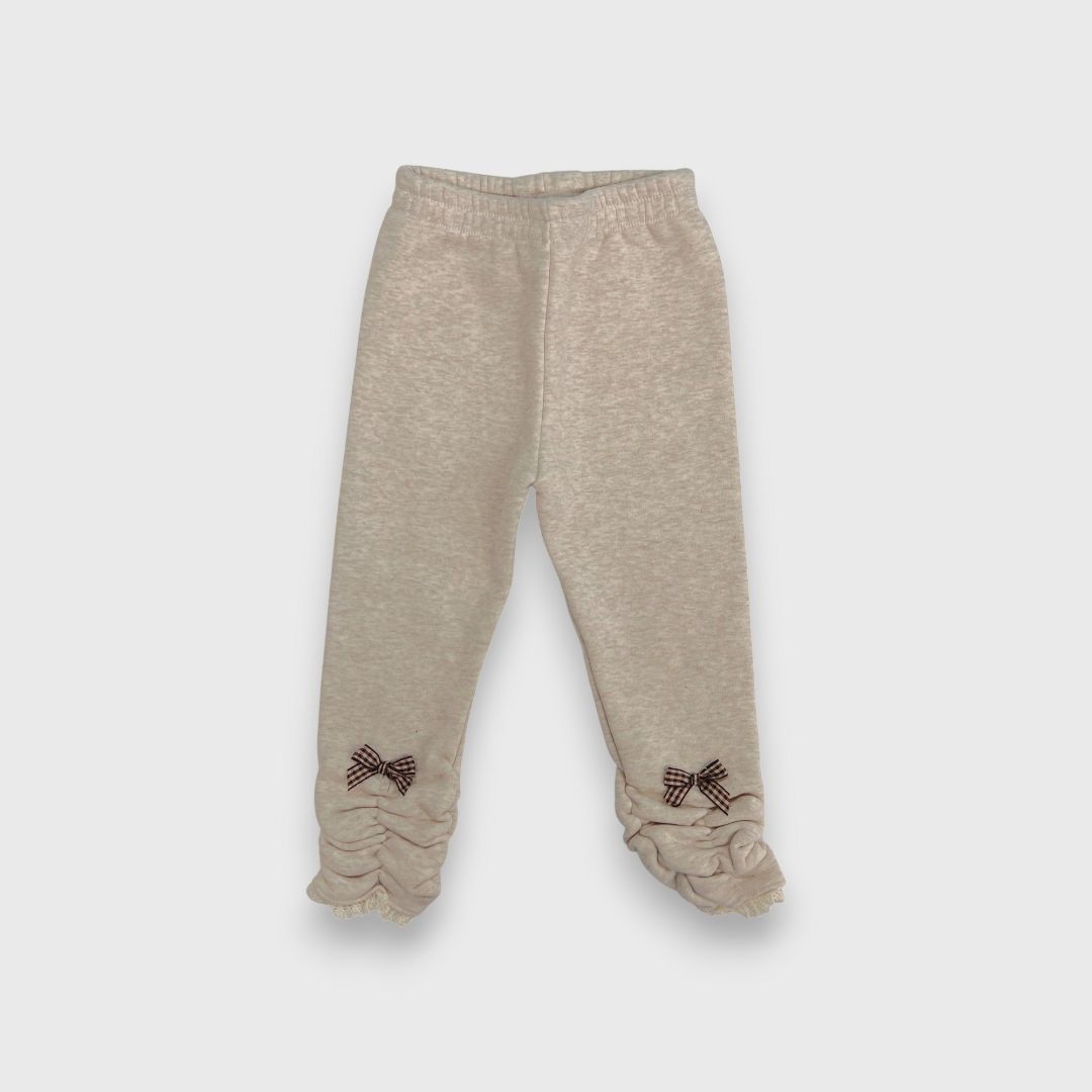 Бежевые леггинсы с бантиками