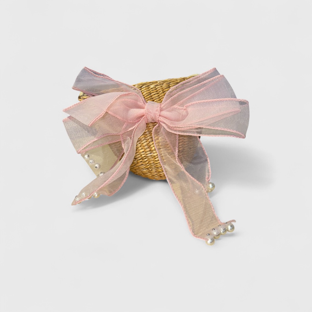 Косичка из ротанга с розовым бантом