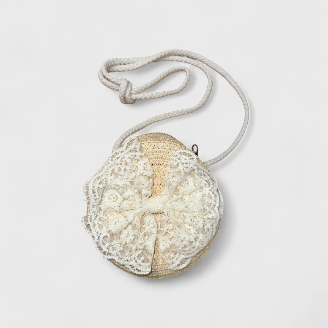 Круглая сумка с бантом