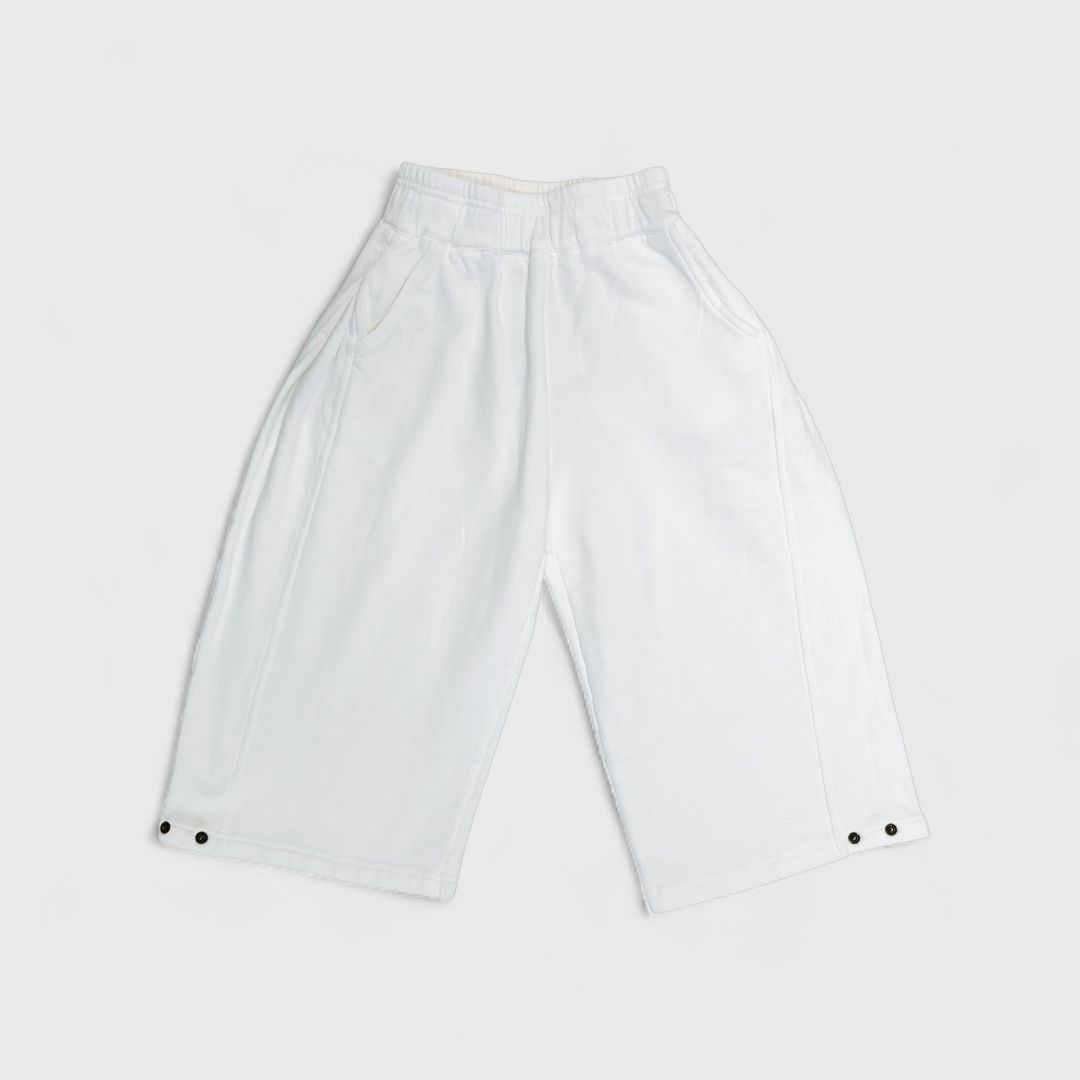 Белые брюки с кнопками