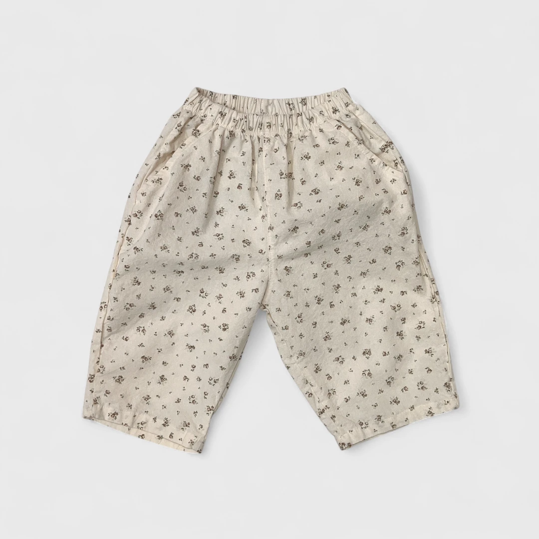 Бежевые цветочные брюки