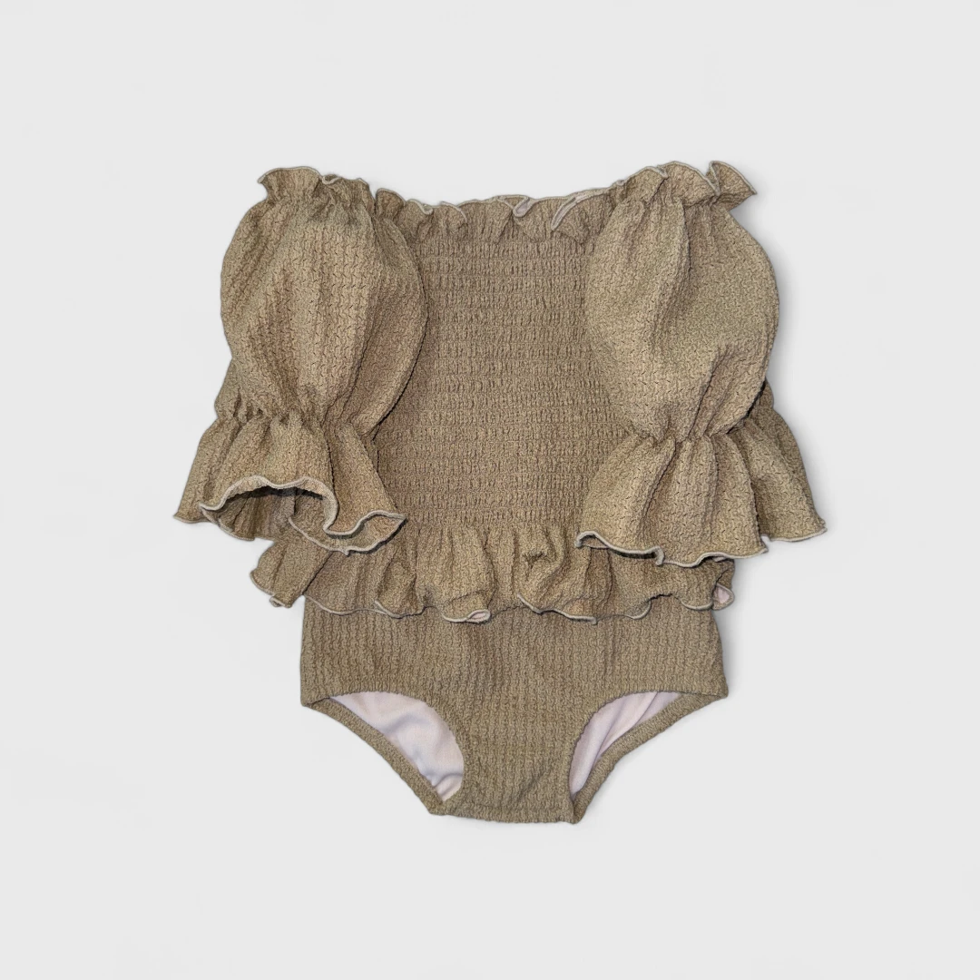 Зеленый купальник с рюшами