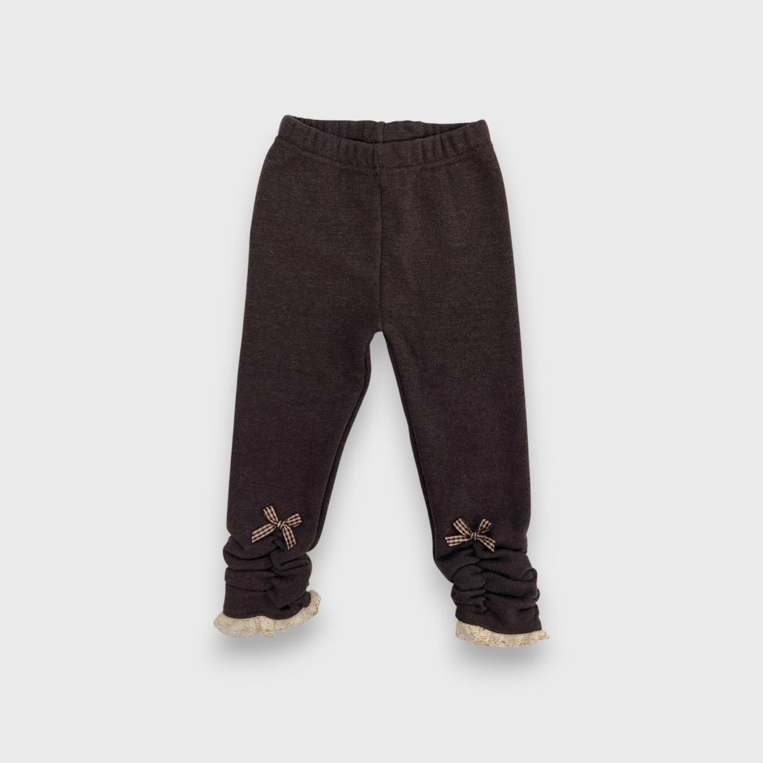 Темные брюки с рюшами для девочек