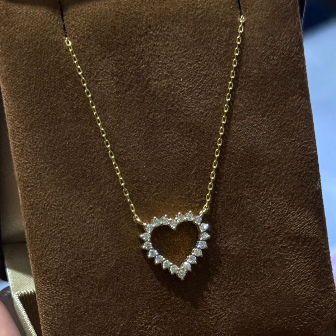 Золотая подвеска в форме сердца