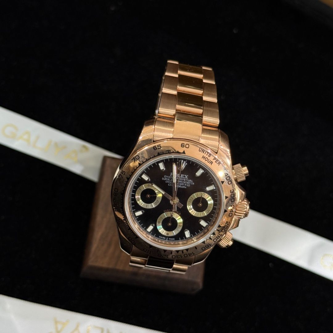 Золотые часы Rolex Daytona