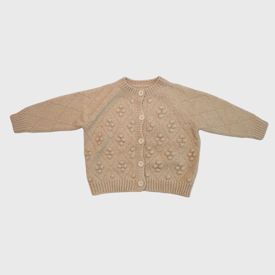 Бежевый кардиган косичка