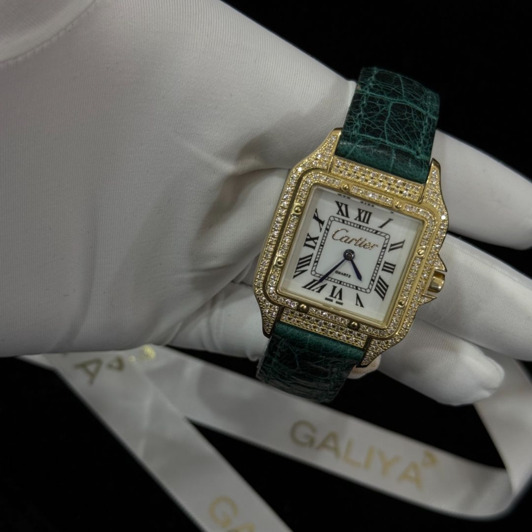 Золотые наручные часы Cartier с зеленым ремешком