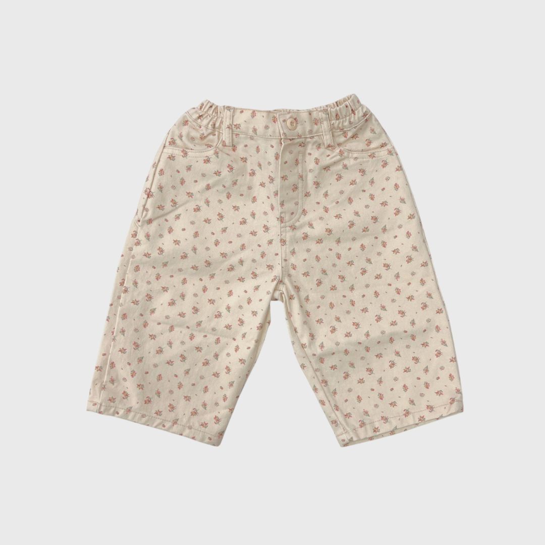 Бежевые джинсы с цветочным принтом