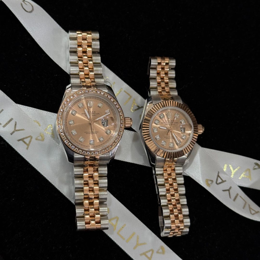 Розовые часы Rolex с золотым браслетом