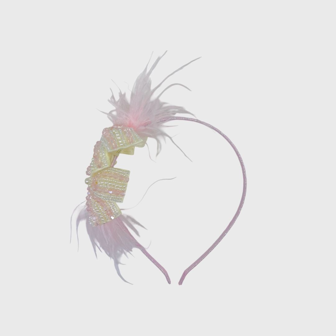Розовый ободок на голову с перьями