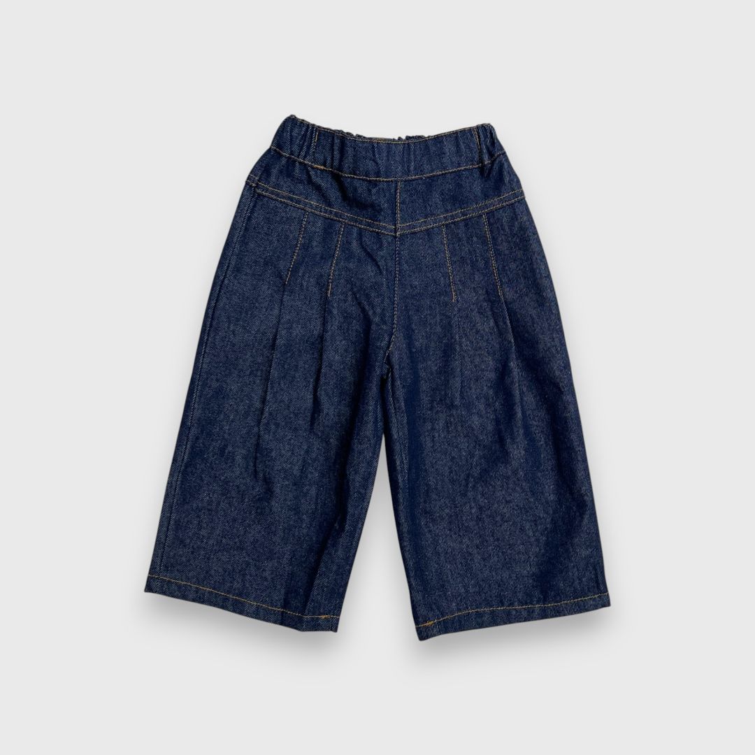 Синие джинсовые брюки