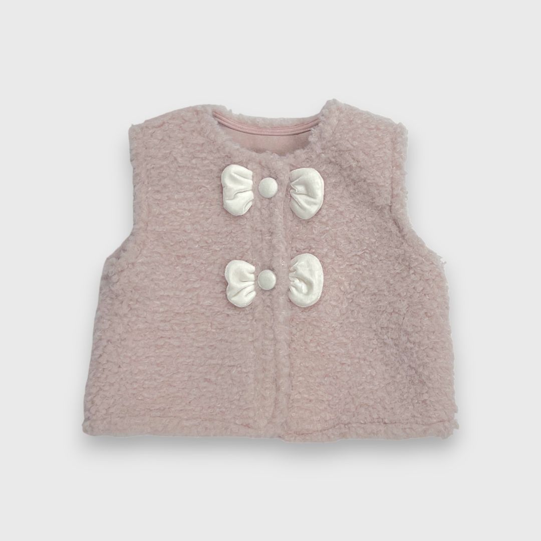 Розовый жилет с бантиками