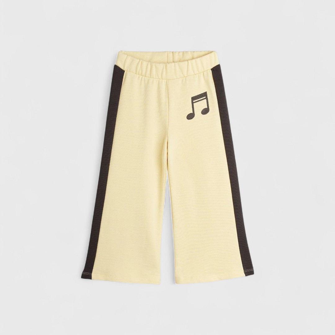 Желтые брюки с нотками черными вставками от M.rodini