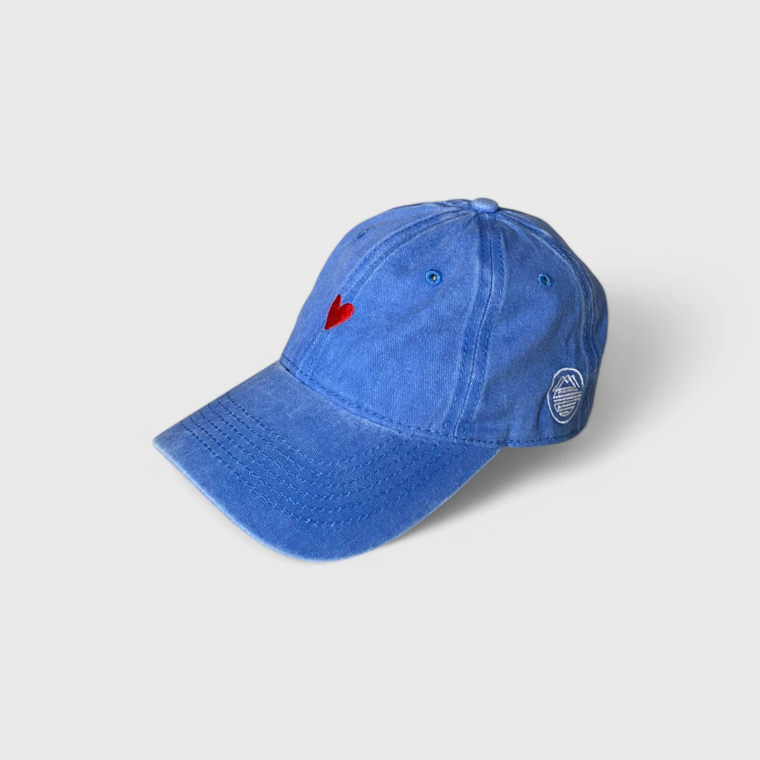 Blue cap with a red heart