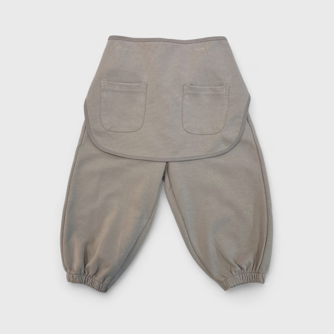 Бежевые штаны фартук