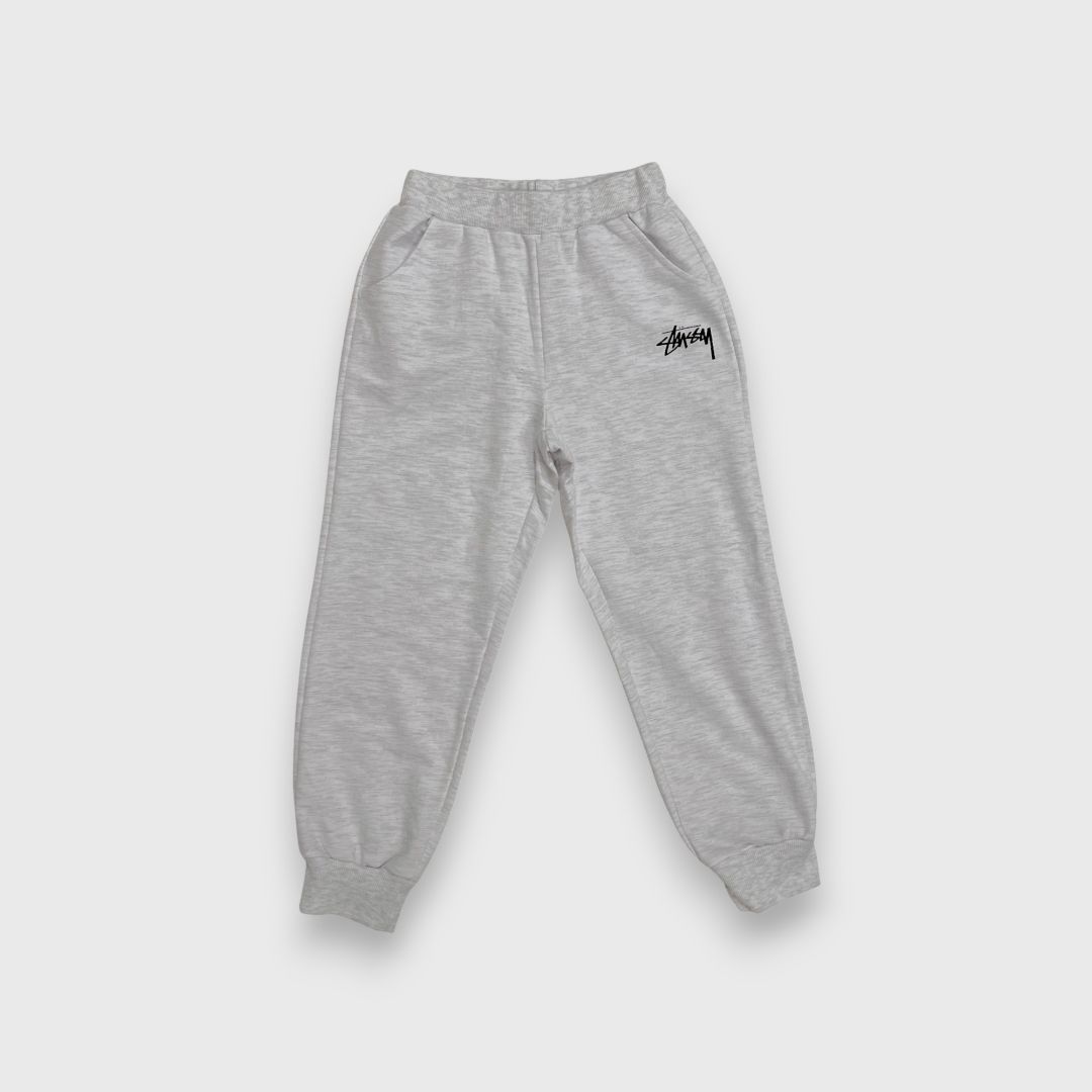 Серые спортивные брюки Stussy