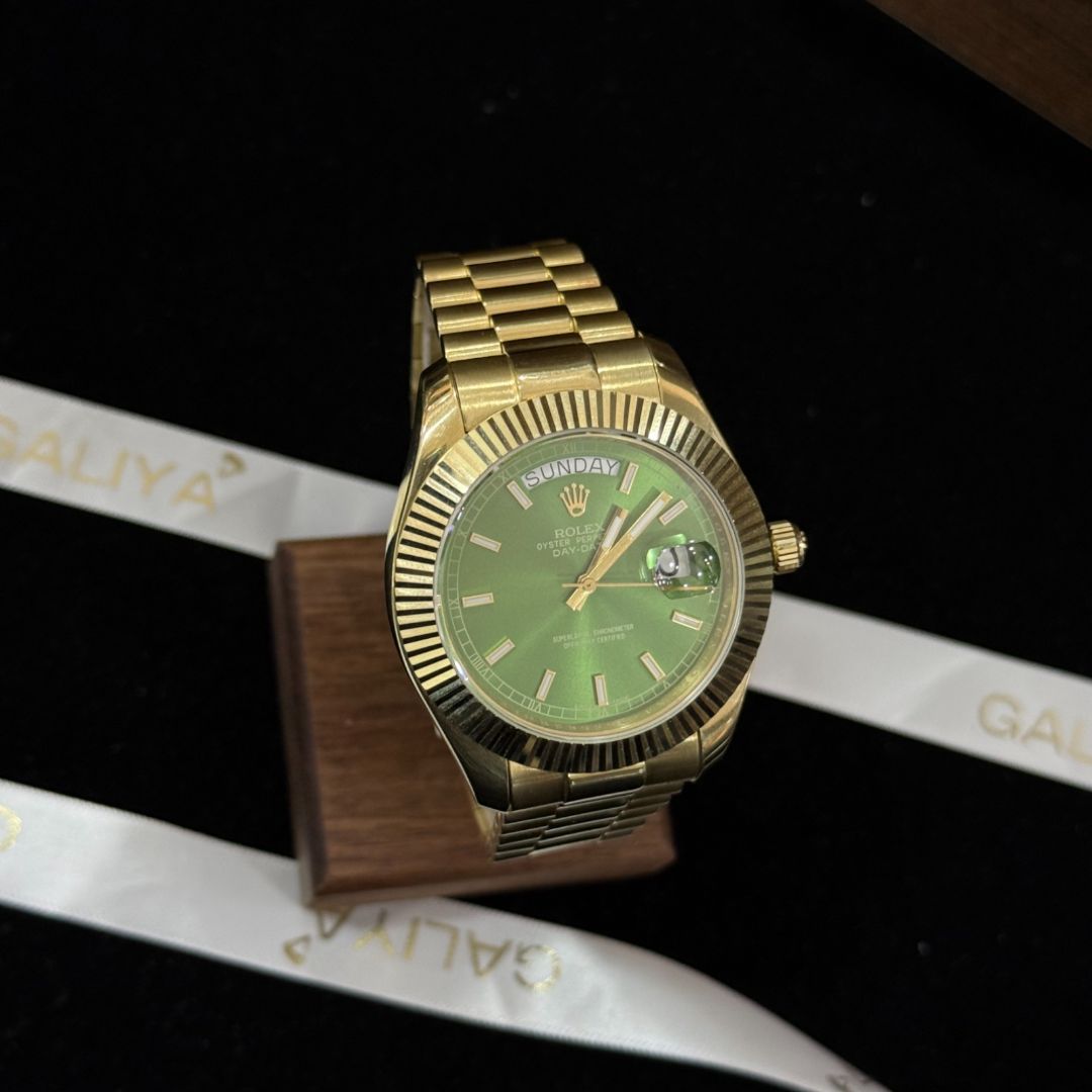 Золотые часы Rolex с зеленым циферблатом