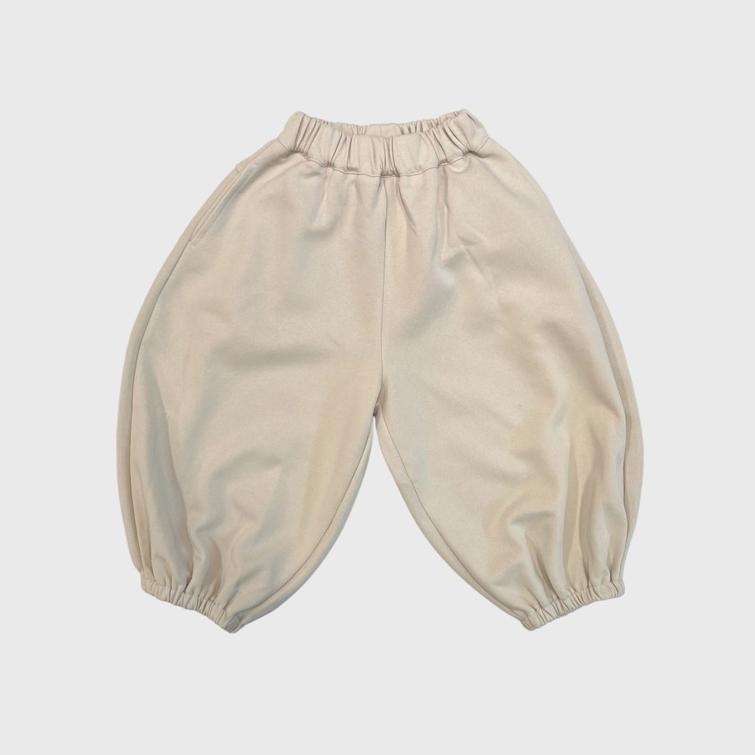 Бежевые брюки-бананы to-e3