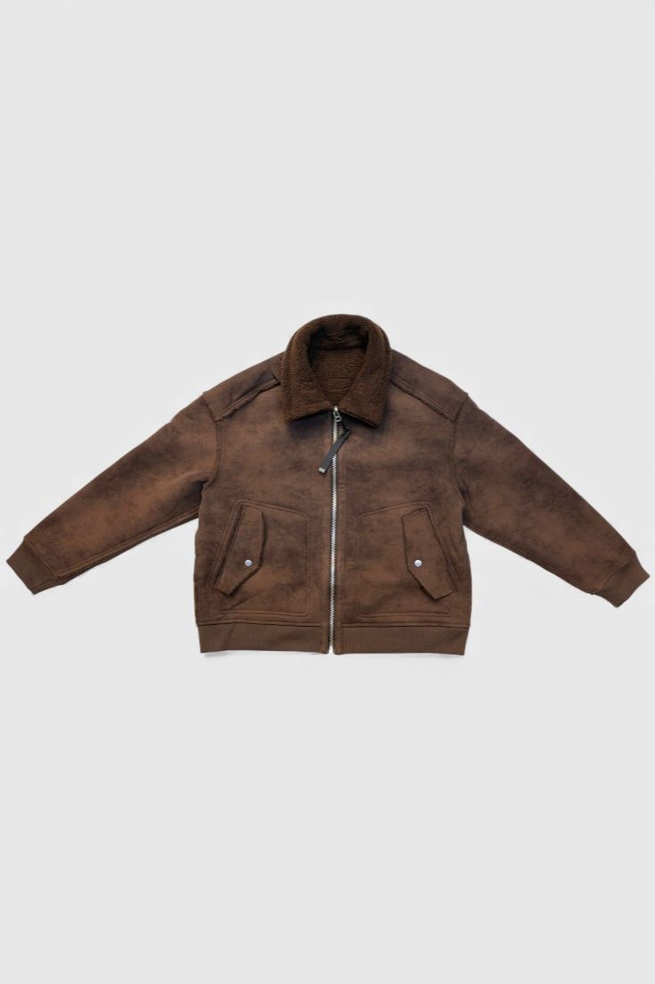 Коричневая куртка с замком