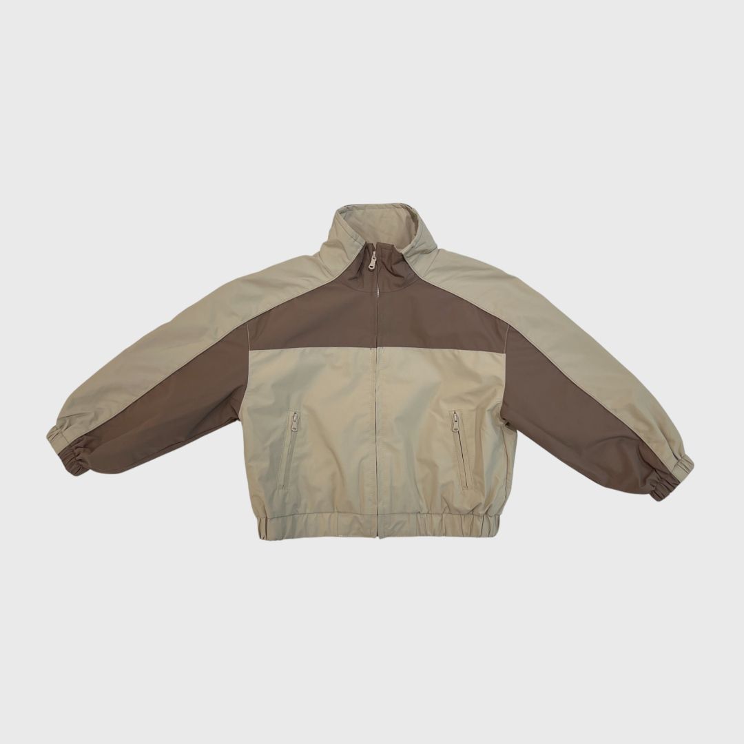 Бежево-коричневая двухцветная куртка