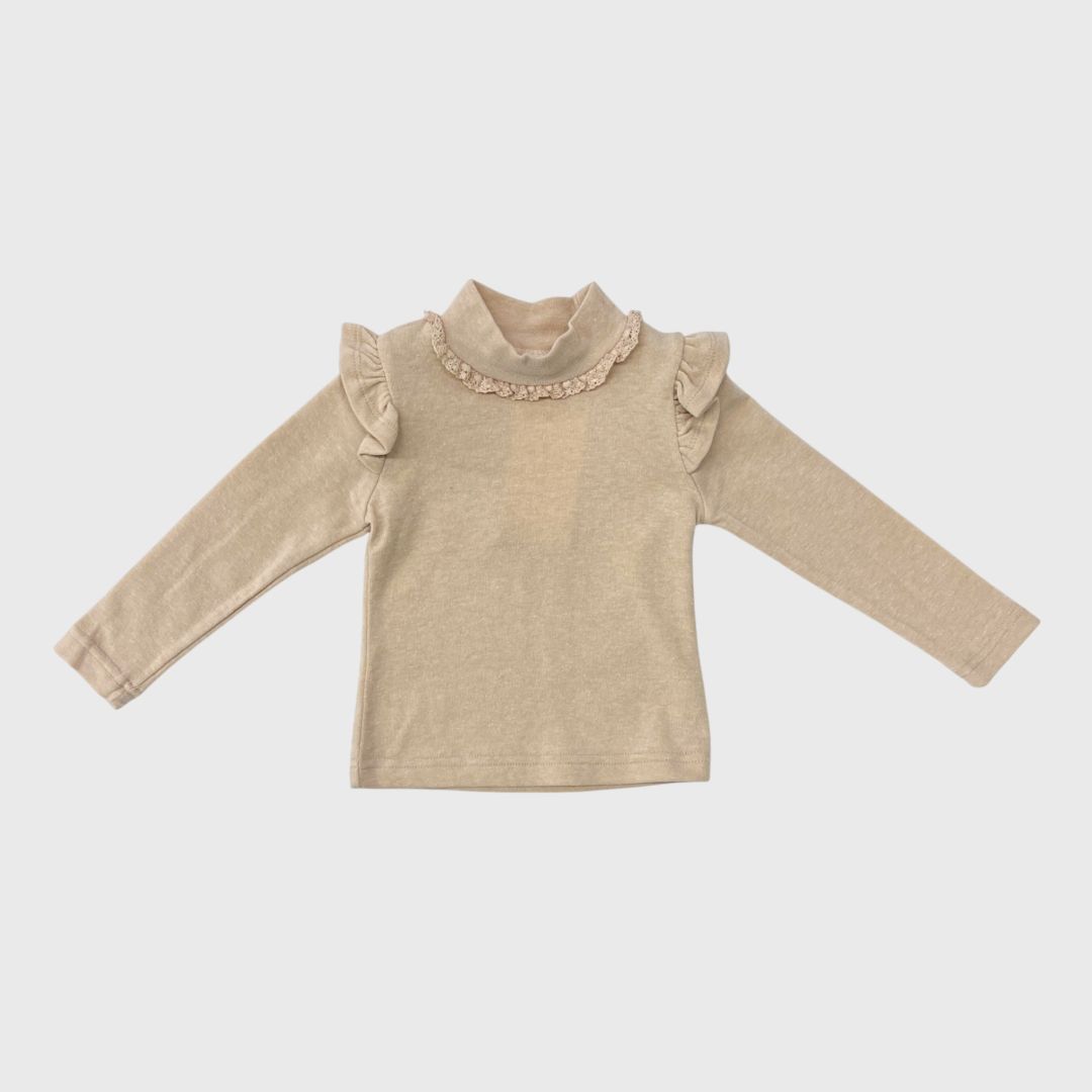 Бежевый лонгслив с рюшами