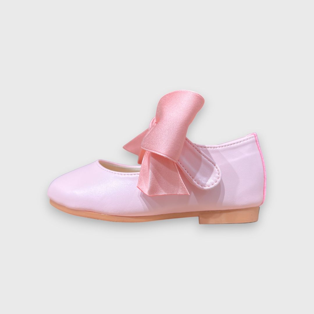 Розовые балетки с бантом