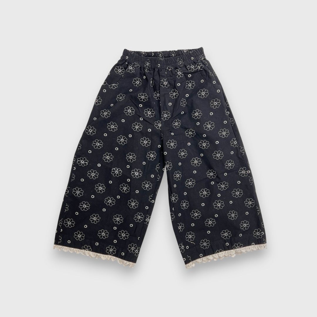 Темно-синие брюки с цветочным принтом