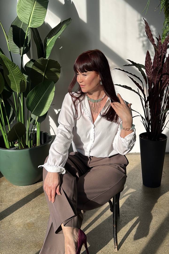 Изысканное украшение из барочного жемчуга и аквамарина 