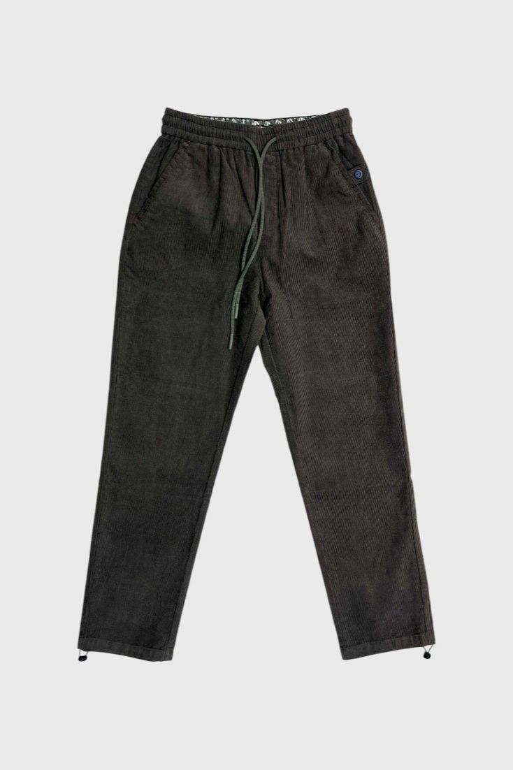 Темно-зеленые брюки из вельвета