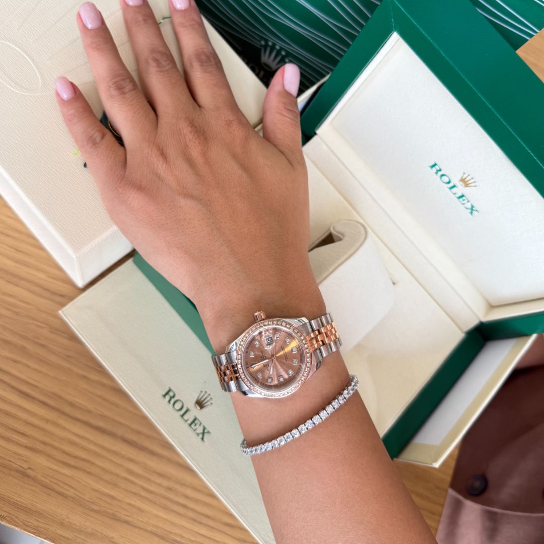 Часы Rolex с розовым циферблатом