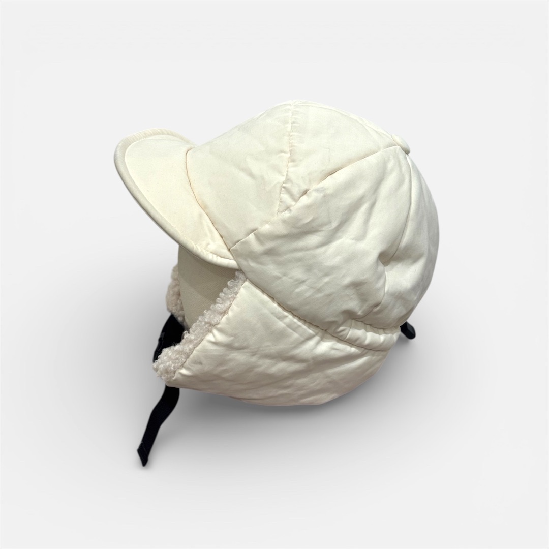 Бежевая утепленная шапка