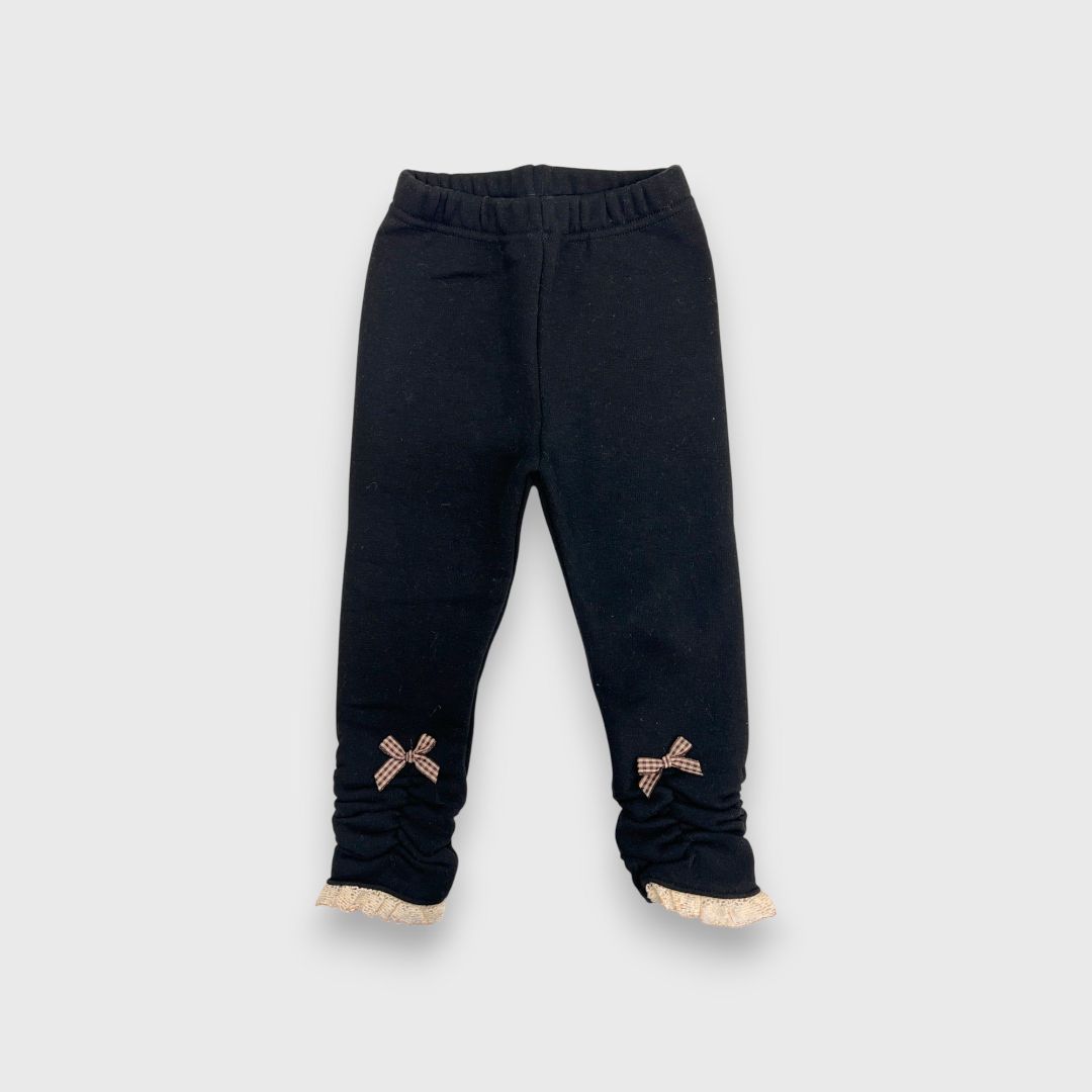 Черные леггинсы с рюшами