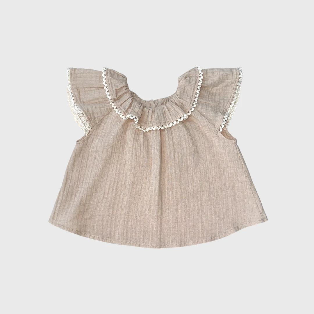 Бежевый топ с рюшами