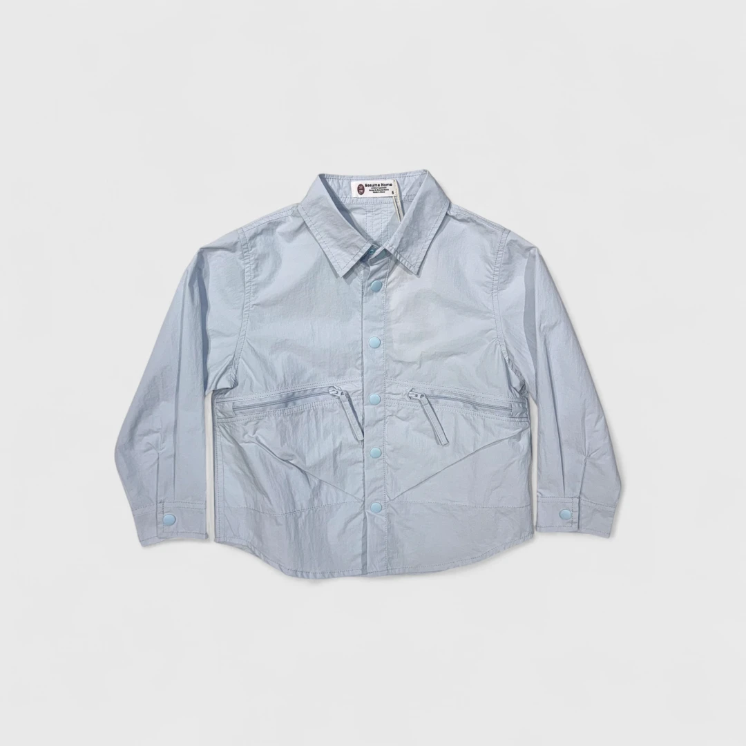 Голубая рубашка с карманами